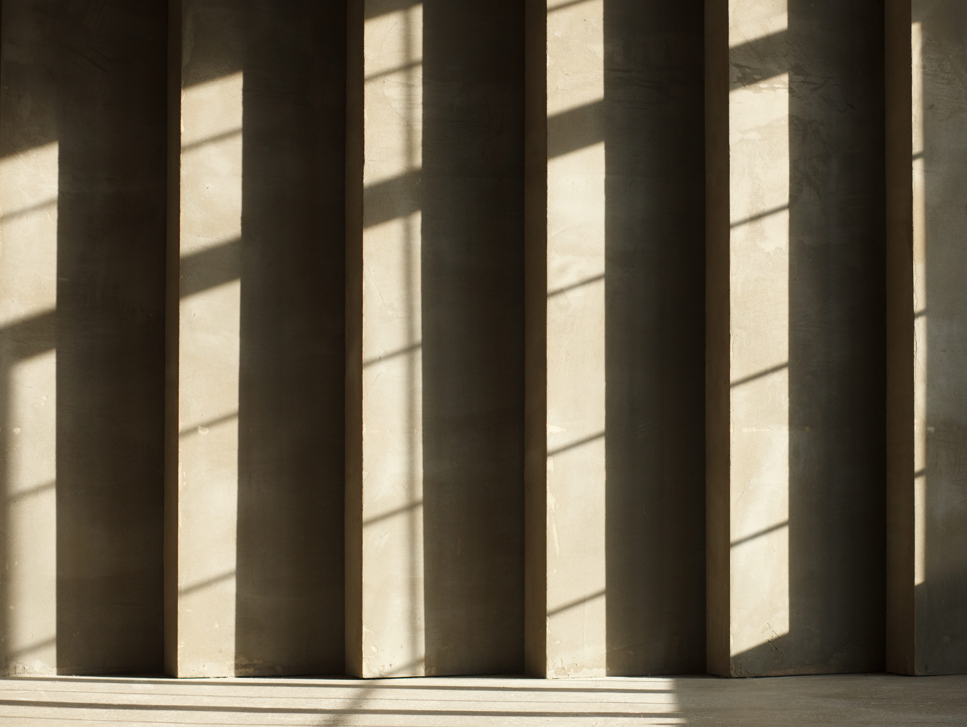 Sunlight and shadow on a concrete wall