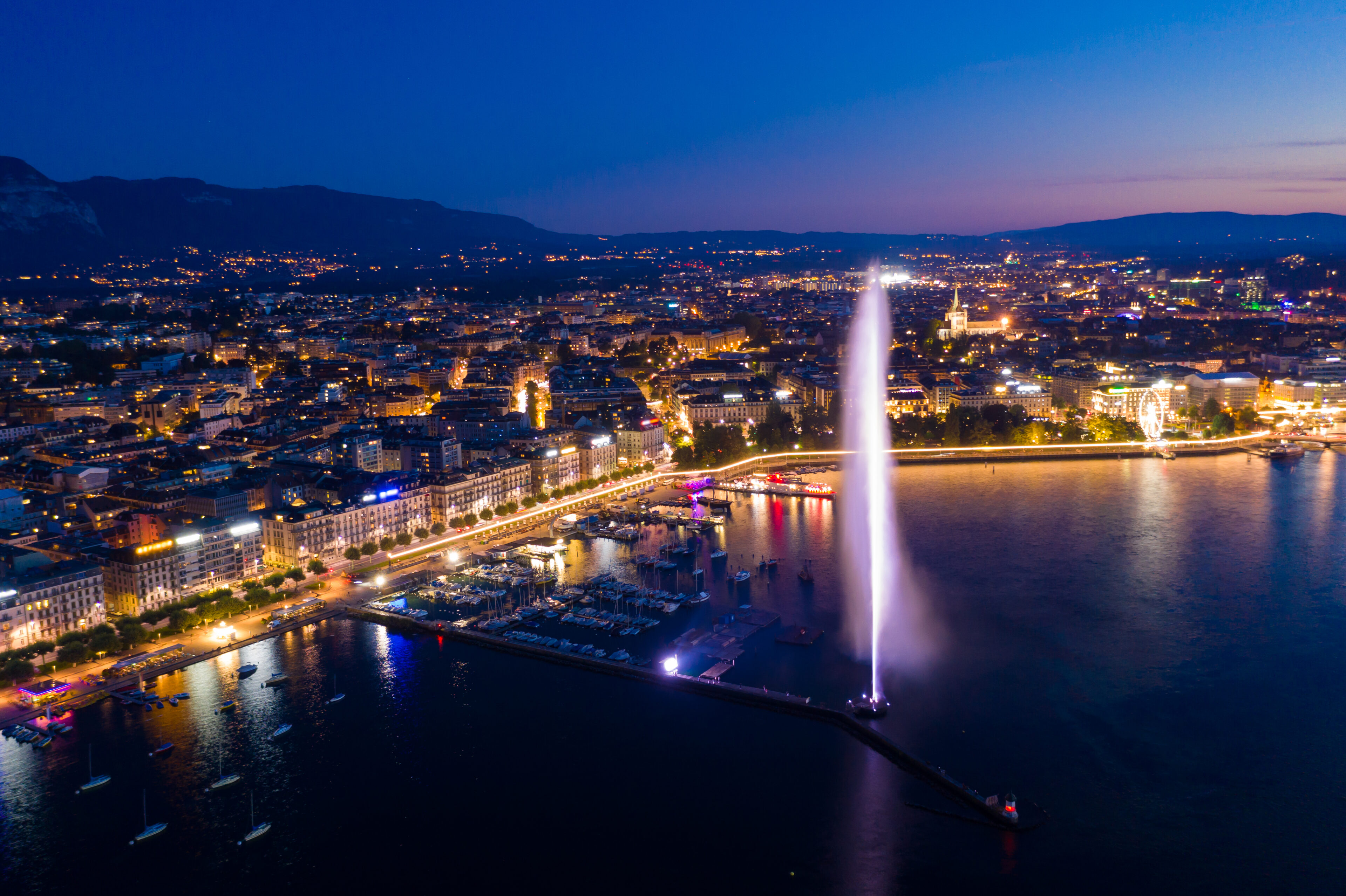 Geneva and the lake fountain at night